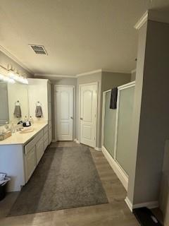 2618 South 2nd Street Waco, TX 76706 - Photo 39 of 40 a large bathroom with a double vanity sink and mirror with shower