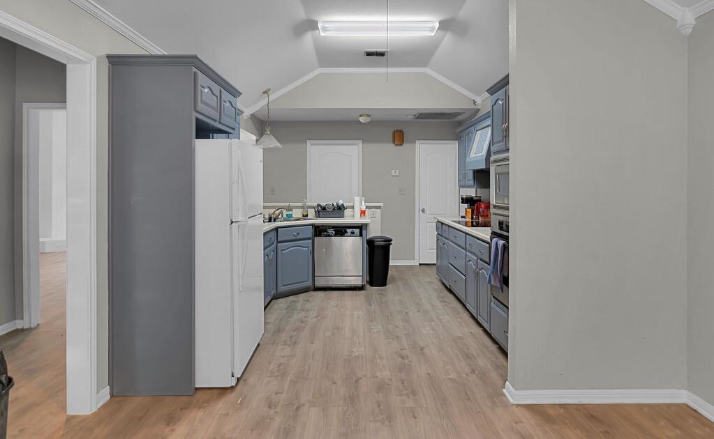 2618 South 2nd Street Waco, TX 76706 - Photo 9 of 40 a kitchen with cabinets and stainless steel appliances