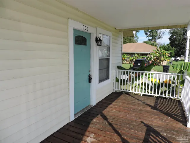 a view of a balcony with an outdoor space