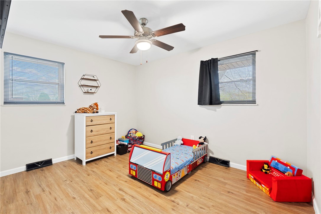 8180 Manning Road Germantown, OH 45327 - Photo 16 of 39 This spacious bedroom features ample natural light and durable flooring, perfect for comfortable living.