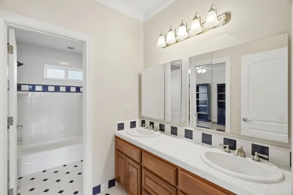 a bathroom with a toilet and a sink