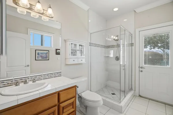 a swimming pool with outdoor seating and yard