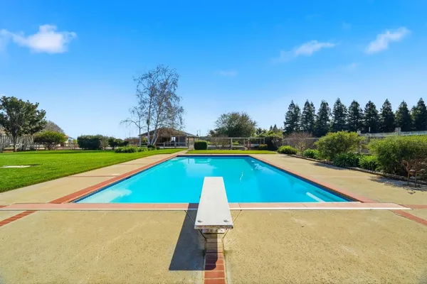 a view of a house with a big yard