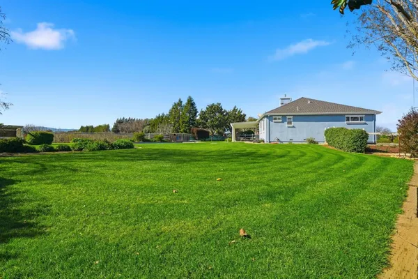 a view of a house with a patio