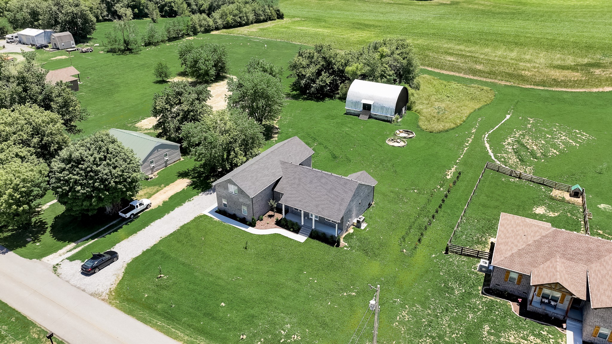 1179 Payne Road Portland, TN 37148 - Photo 34 of 34 an aerial view of a house with garden space and street view