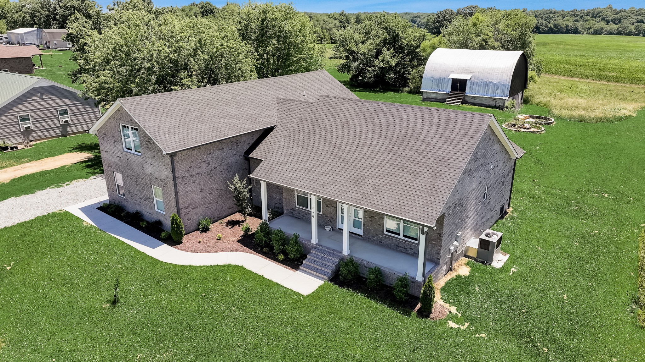 1179 Payne Road Portland, TN 37148 - Photo 4 of 34 an aerial view of a house having yard