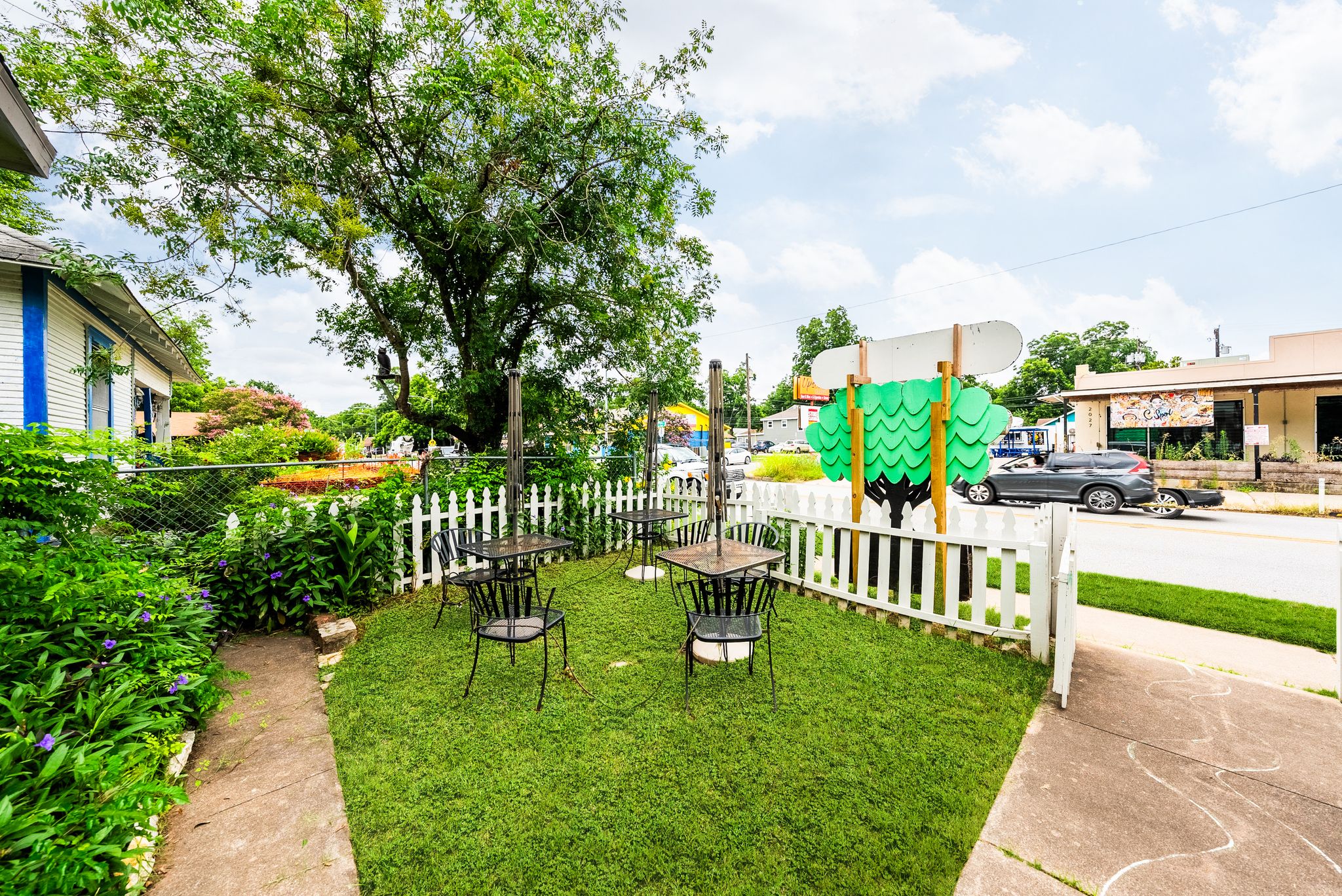 2032 East Cesar Chavez Street Austin, TX 78702 - Photo 20 of 25 a view of a chair and table in the garden