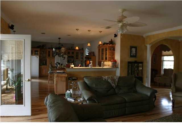 164 Blue Heron Road Santa Rosa Beach, FL 32459 - Photo 6 of 12 a living room with furniture and a large window