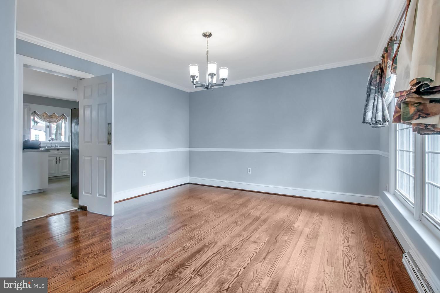 625 Kilburn Road Wilmington, DE 19803 - Photo 8 of 35 Neutral gray paint & updated chandelier