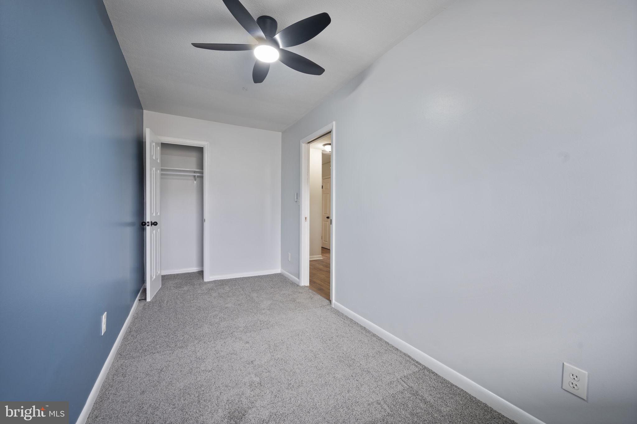 417 Meadow Road Baltimore, MD 21206 - Photo 11 of 47 wooden floor in an empty room