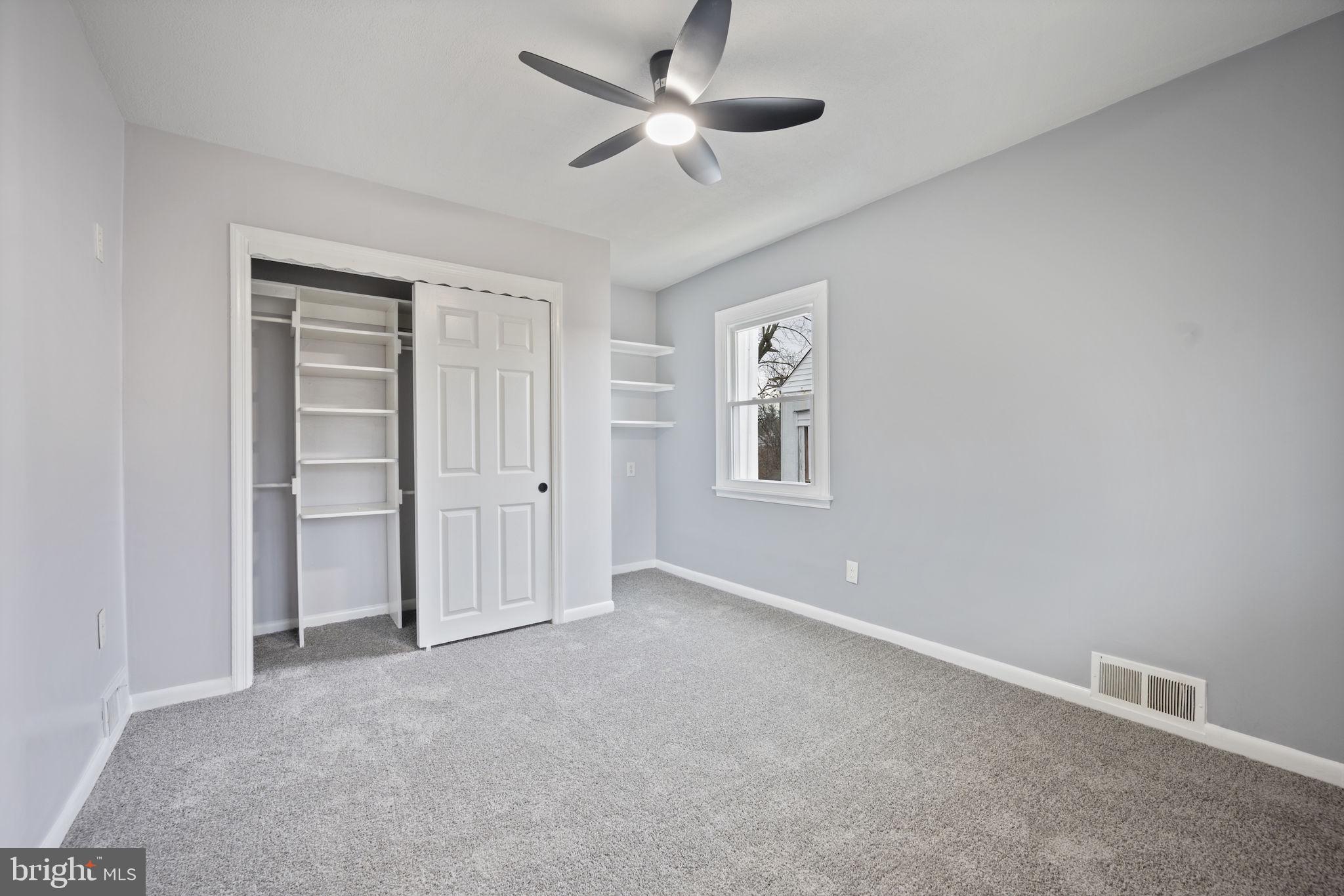 417 Meadow Road Baltimore, MD 21206 - Photo 12 of 47 a view of an empty room with a window
