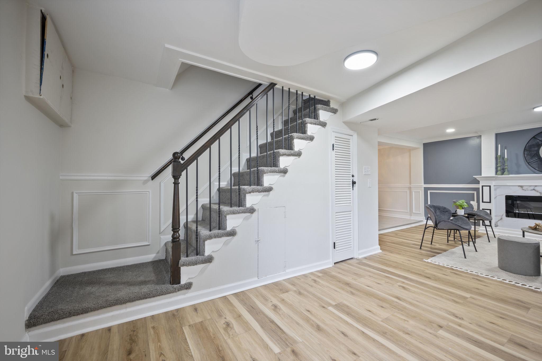 417 Meadow Road Baltimore, MD 21206 - Photo 21 of 47 a view of entryway and hall with wooden floor