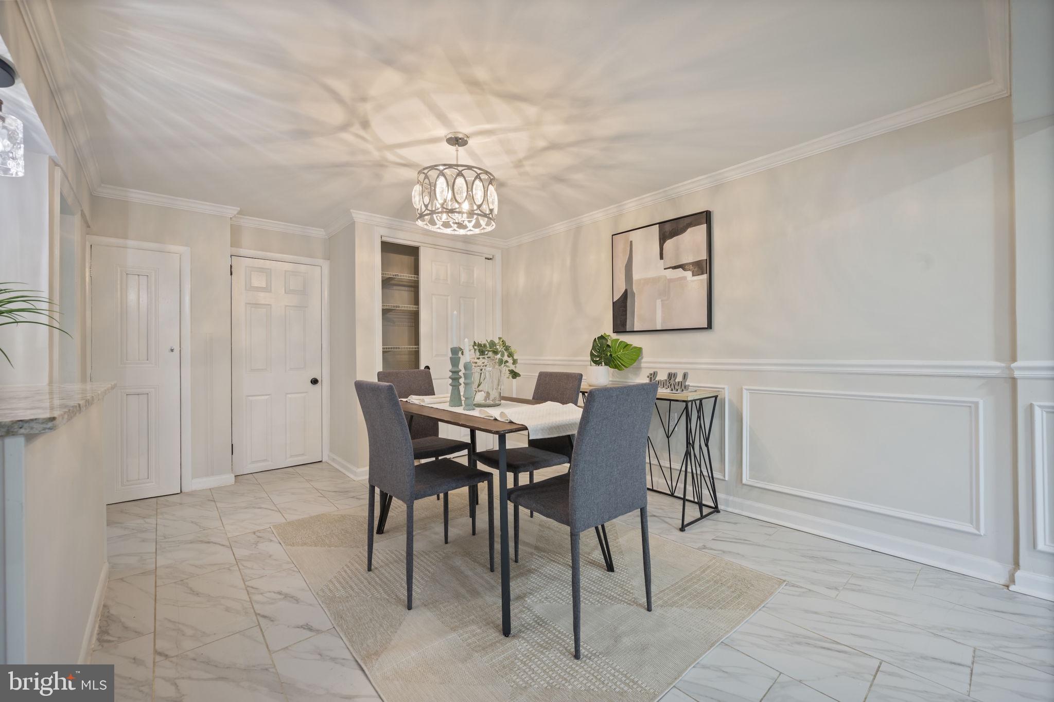 417 Meadow Road Baltimore, MD 21206 - Photo 29 of 47 a view of a dining room with furniture