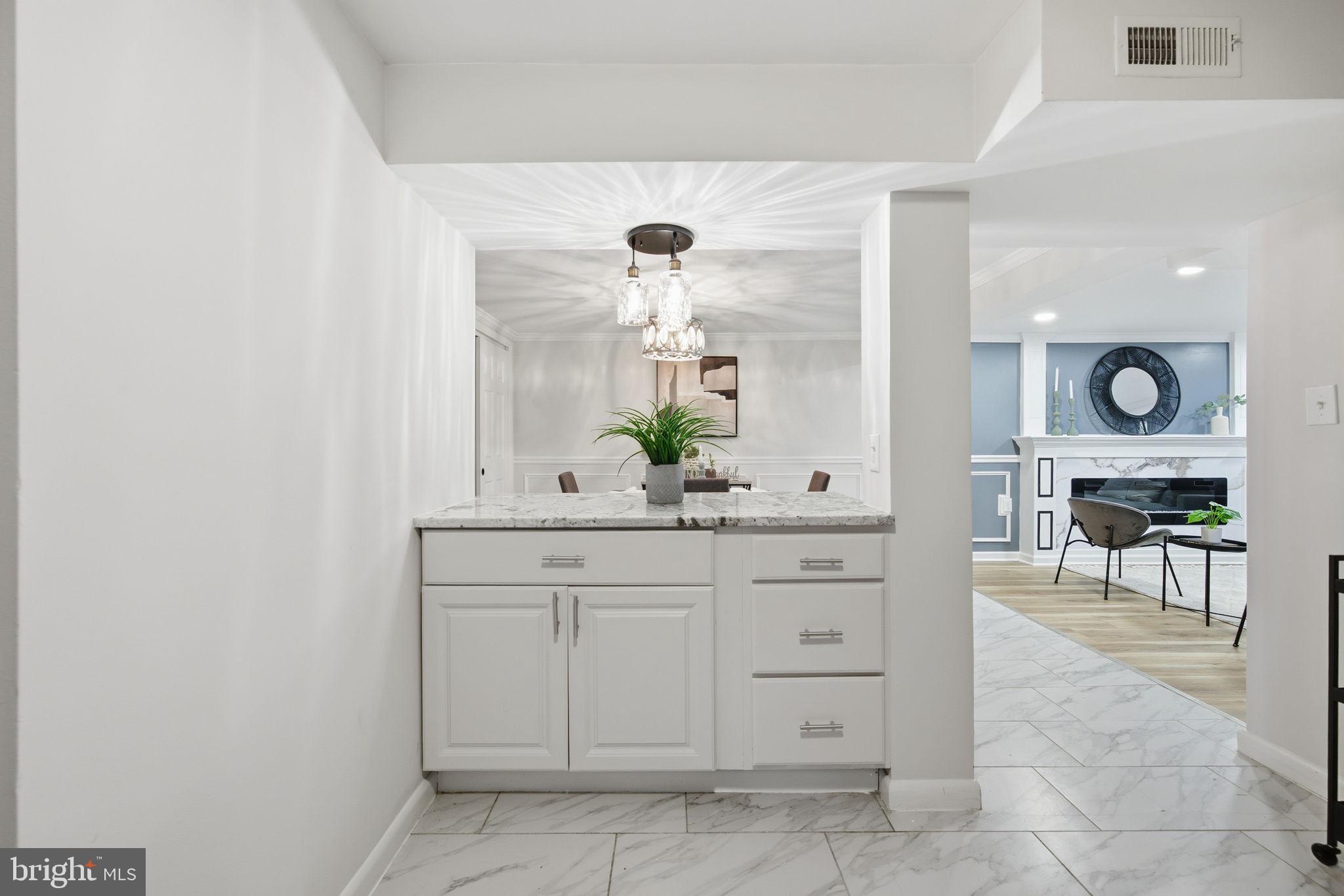 417 Meadow Road Baltimore, MD 21206 - Photo 34 of 47 a bathroom with a sink and a mirror
