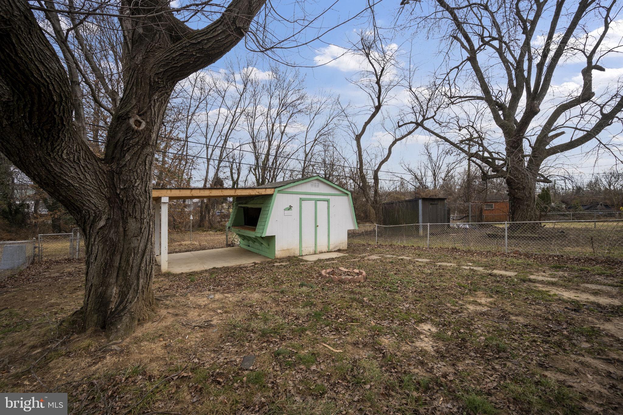 417 Meadow Road Baltimore, MD 21206 - Photo 46 of 47 a front view of a house with a yard