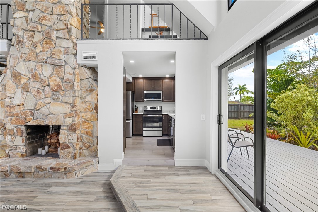 12991 Iona Road Fort Myers, FL 33908 - Photo 13 of 43 a view of an entryway and livingroom with furniture