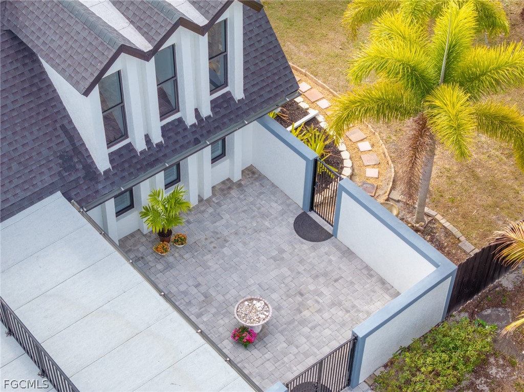 12991 Iona Road Fort Myers, FL 33908 - Photo 39 of 43 a view of a backyard with plants
