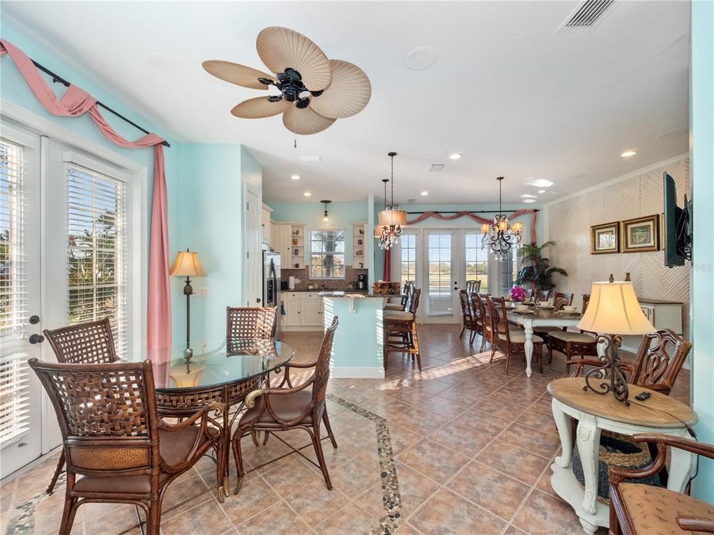 1424 Titian Court Reunion, FL 34747 - Photo 13 of 63 a view of a dining room with furniture