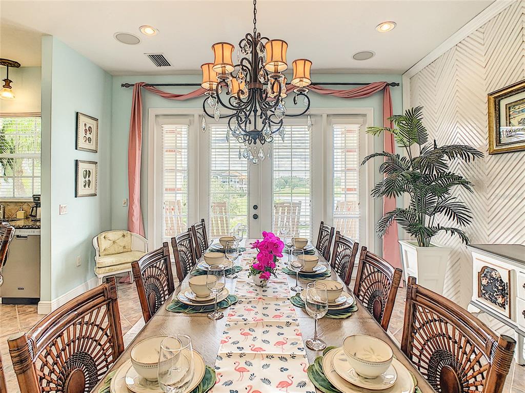 1424 Titian Court Reunion, FL 34747 - Photo 16 of 63 a view of a dining room with furniture window and wooden floor