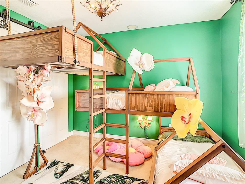 1424 Titian Court Reunion, FL 34747 - Photo 24 of 63 a view of a patio with table and chairs