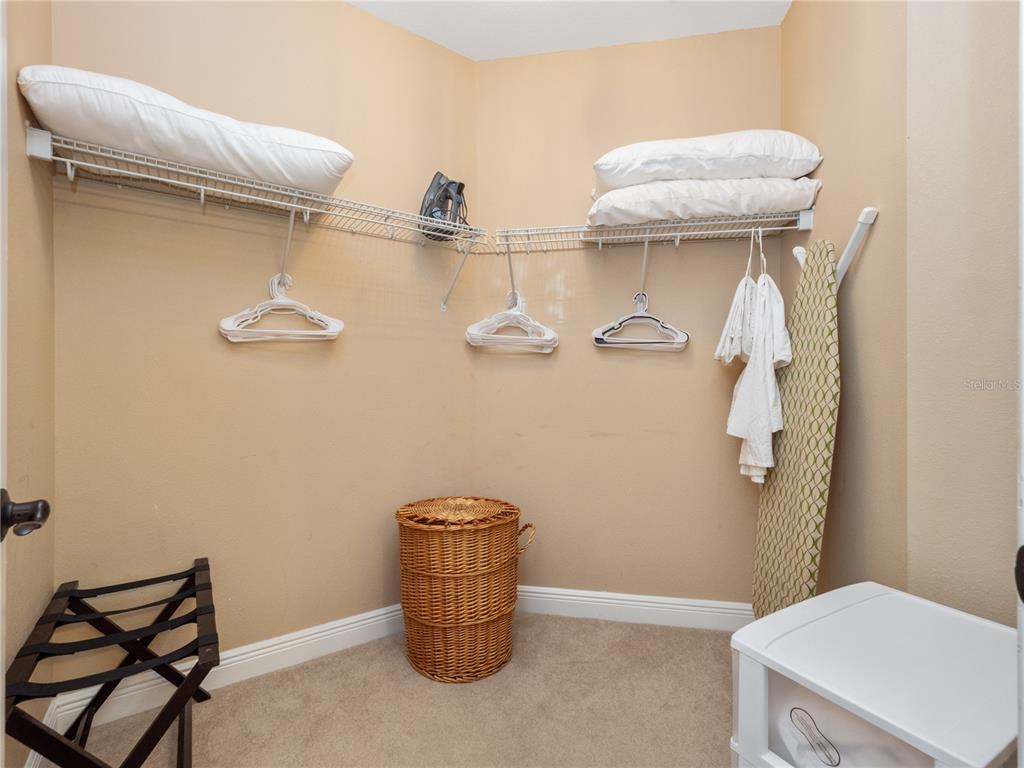 1424 Titian Court Reunion, FL 34747 - Photo 29 of 63 a bathroom with a toilet and a mirror