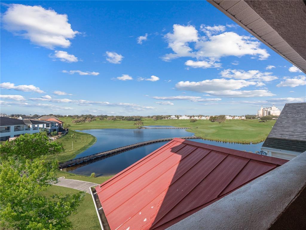 1424 Titian Court Reunion, FL 34747 - Photo 37 of 63 a view of swimming pool with a lake view