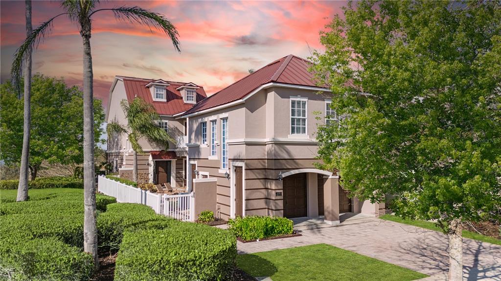 1424 Titian Court Reunion, FL 34747 - Photo 48 of 63 a front view of a house with garden