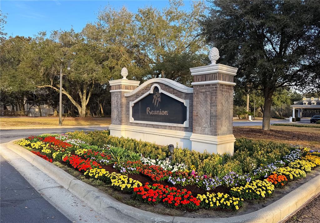 1424 Titian Court Reunion, FL 34747 - Photo 51 of 63 a view of a garden with flowers and trees