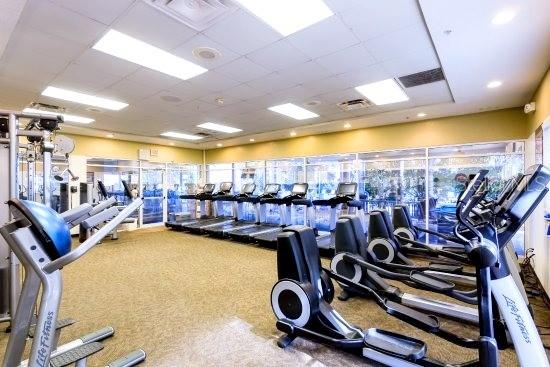 1424 Titian Court Reunion, FL 34747 - Photo 54 of 63 a view of a room with gym equipment