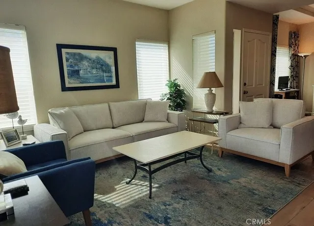 a living room with furniture and a couch