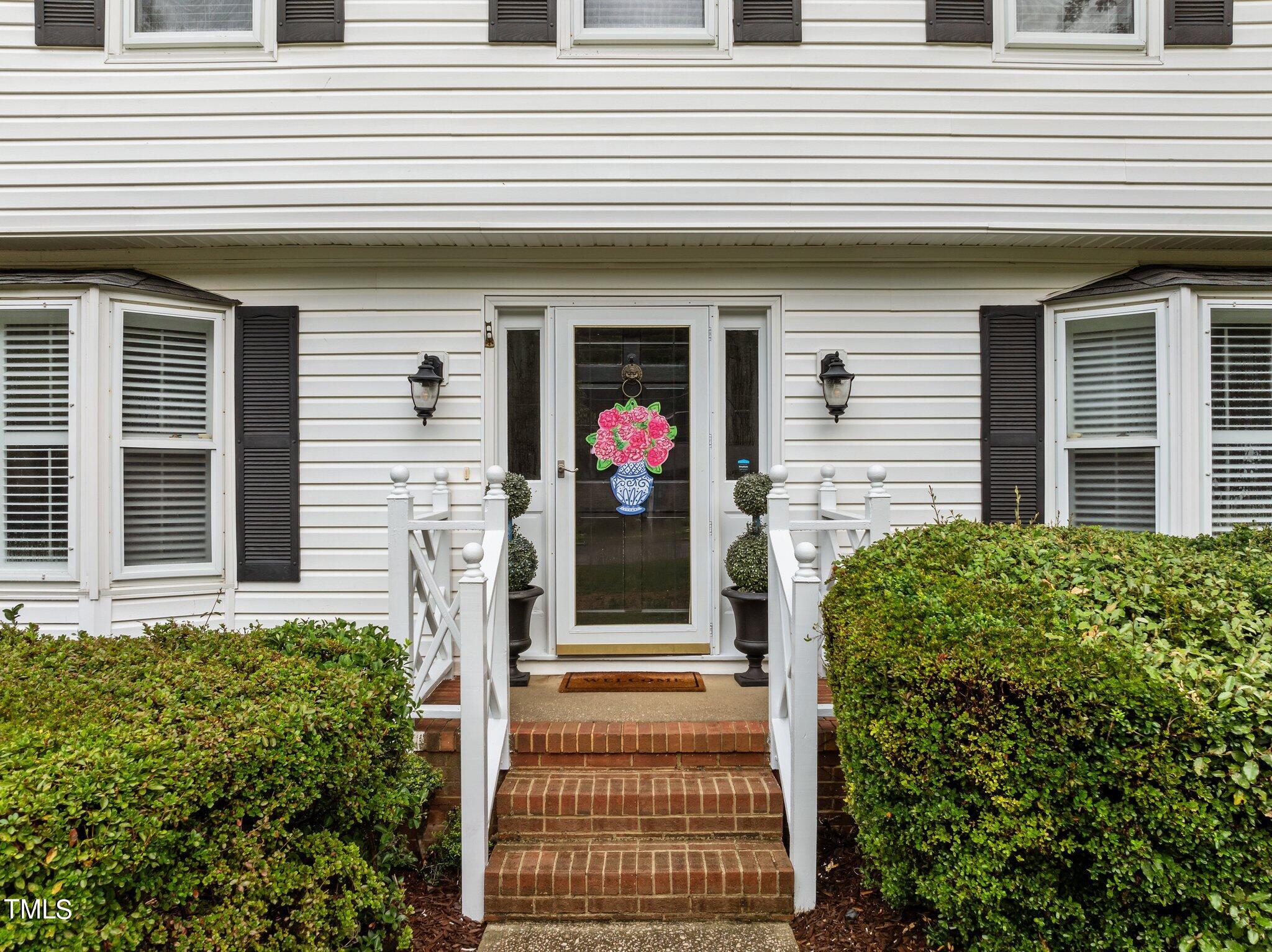 801 Purdue Street Raleigh, NC 27609 - Photo 2 of 40 a front view of a house with glass windows