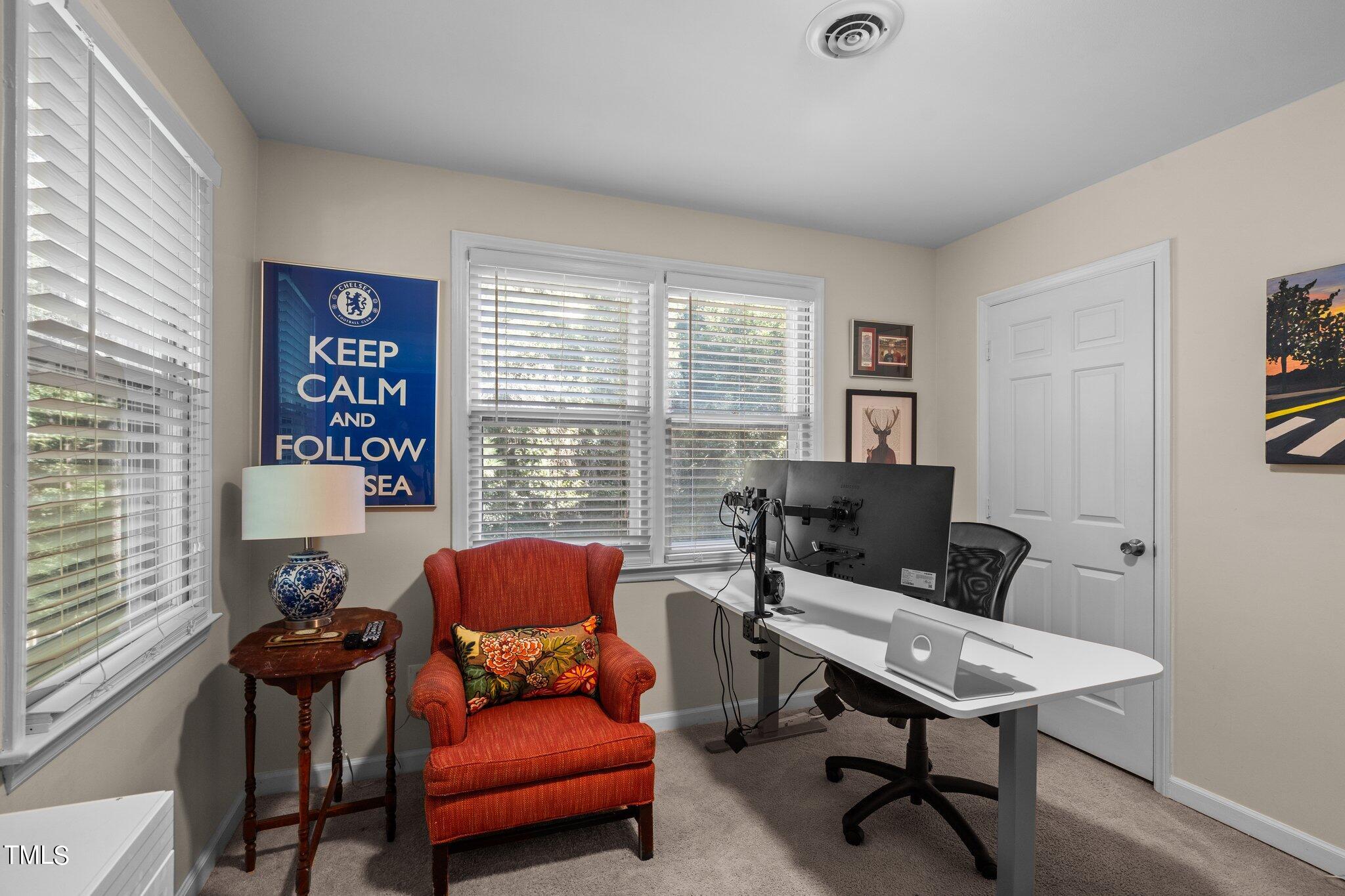801 Purdue Street Raleigh, NC 27609 - Photo 25 of 40 a living room with furniture and a window