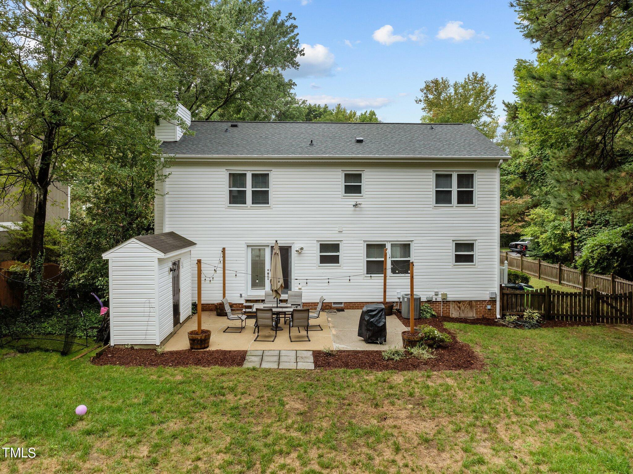 801 Purdue Street Raleigh, NC 27609 - Photo 30 of 40 a house view with a garden space