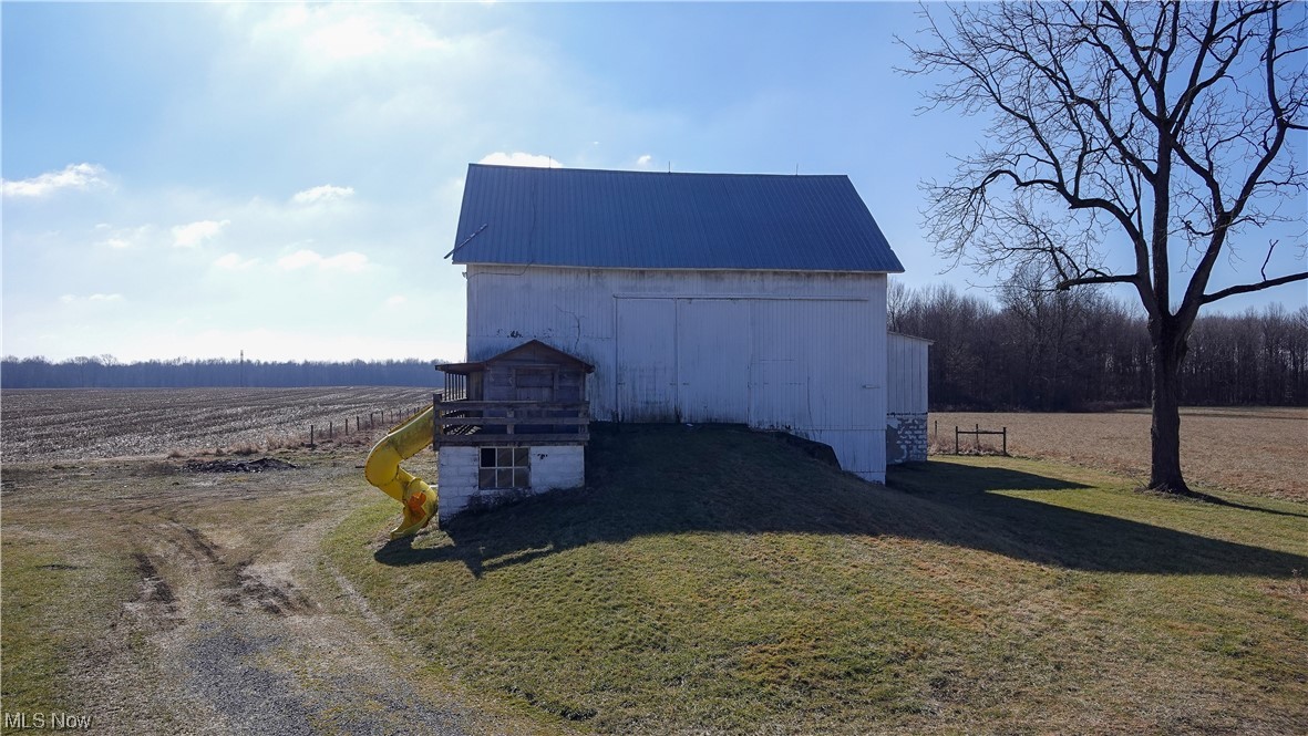 10258 Gilbert Road Newton Falls, OH 44444 - Photo 30 of 37 View of outdoor structure with a rural view and a yard