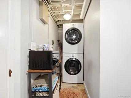 a view of a room with washer and dryer