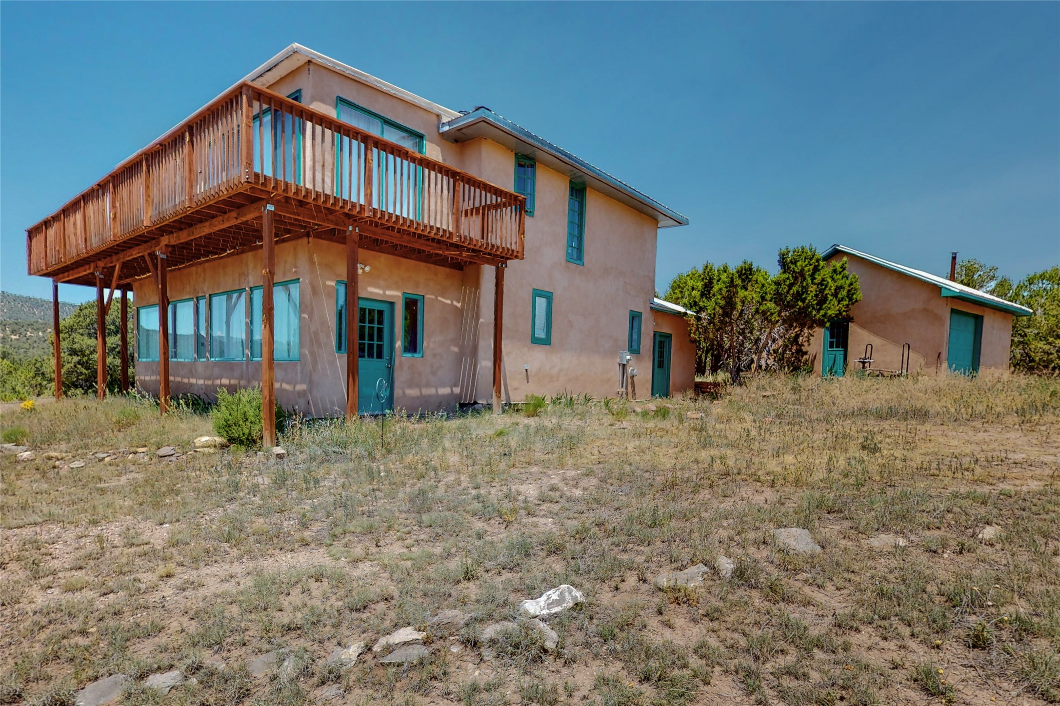 175 Hidden Valley Ranch Road Ilfeld, NM 87538 - Photo 1 of 43 House, garage/shop view from the south heading north