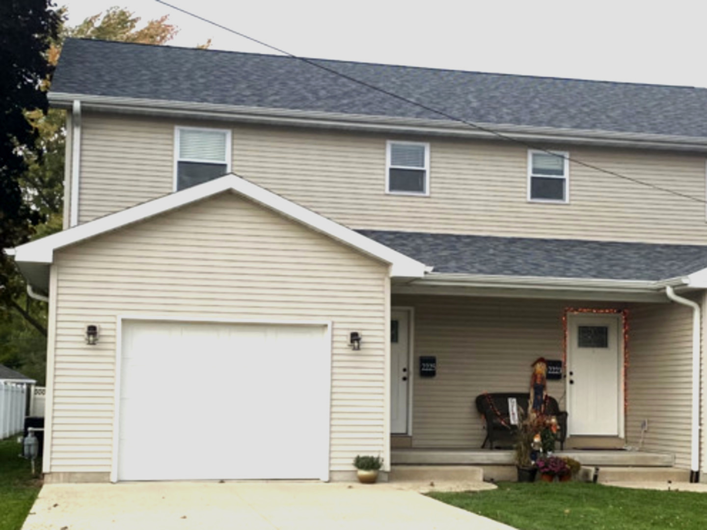 a front view of a house with yard