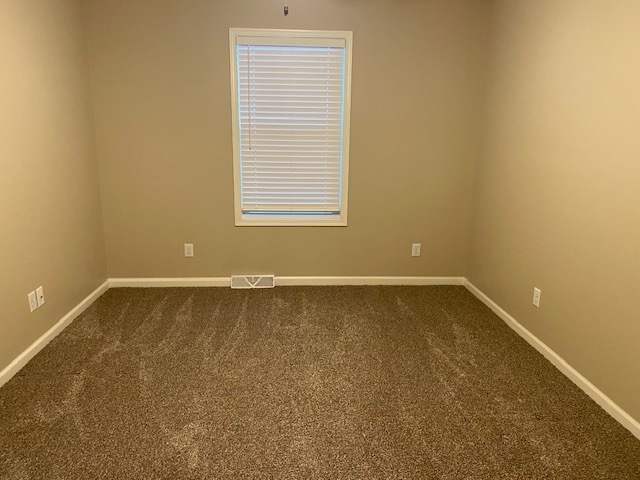 2225 7th Street Peru, IL 61354 - Photo 11 of 15 an empty room with a window