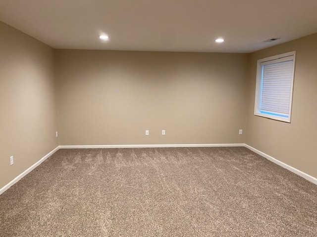 2225 7th Street Peru, IL 61354 - Photo 13 of 15 an empty room with a workbench