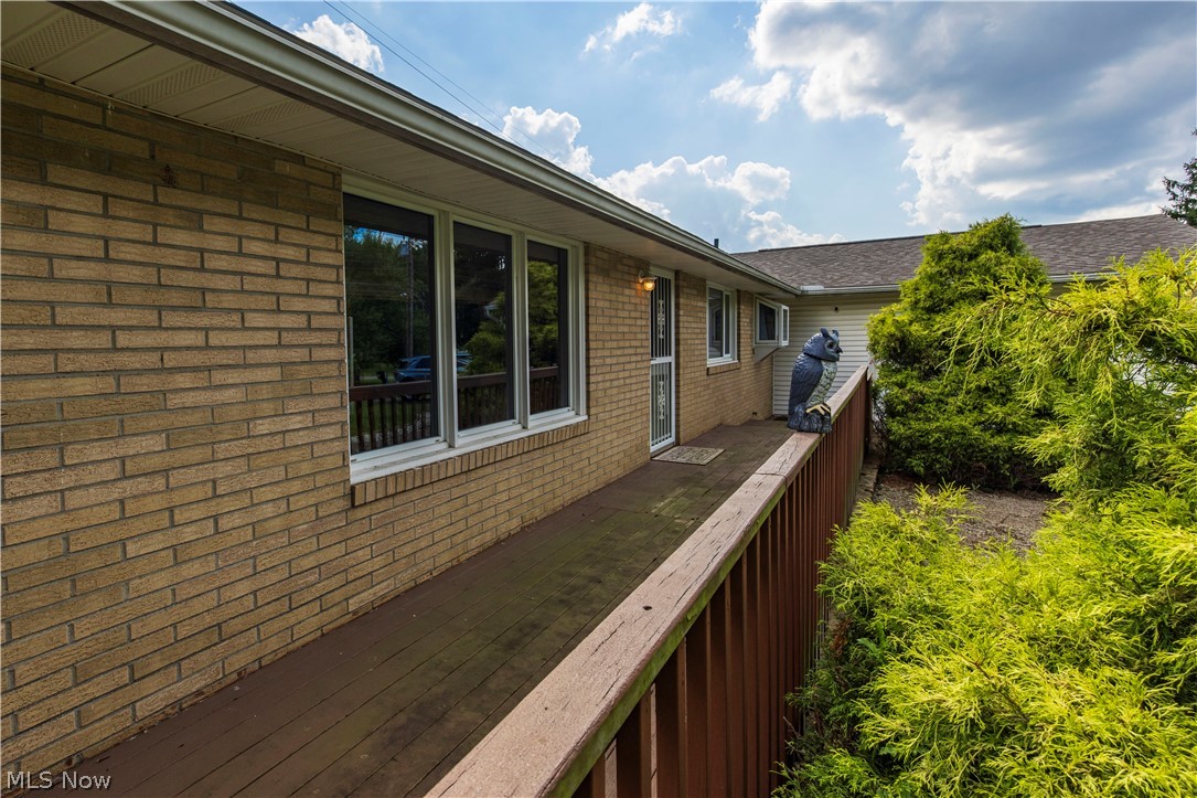 Beautiful front deck to relax and enjoy time outside
