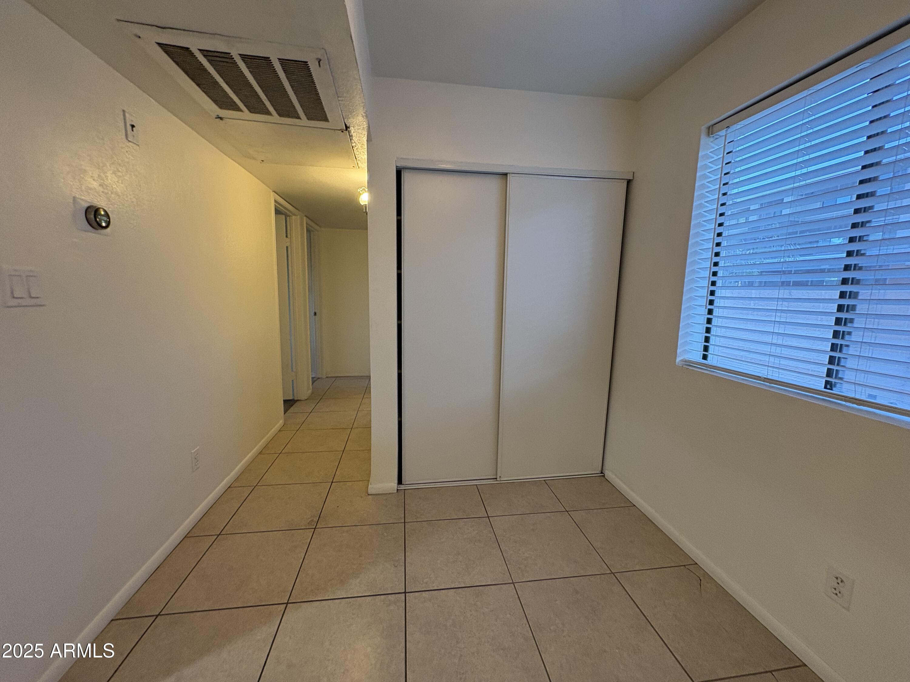 2938 North 61st Place, Unit 150 Scottsdale, AZ 85251 - Photo 13 of 24 a view of an empty room