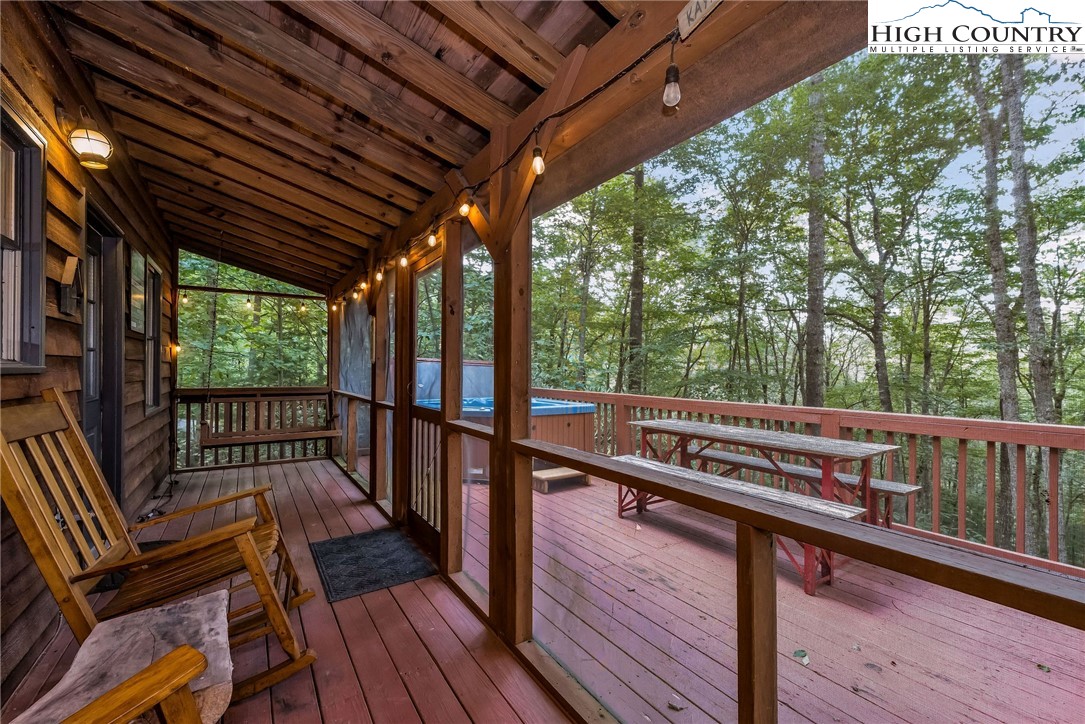 199 Skyline Road West Jefferson, NC 28694 - Photo 14 of 35 a view of a two chairs in the balcony