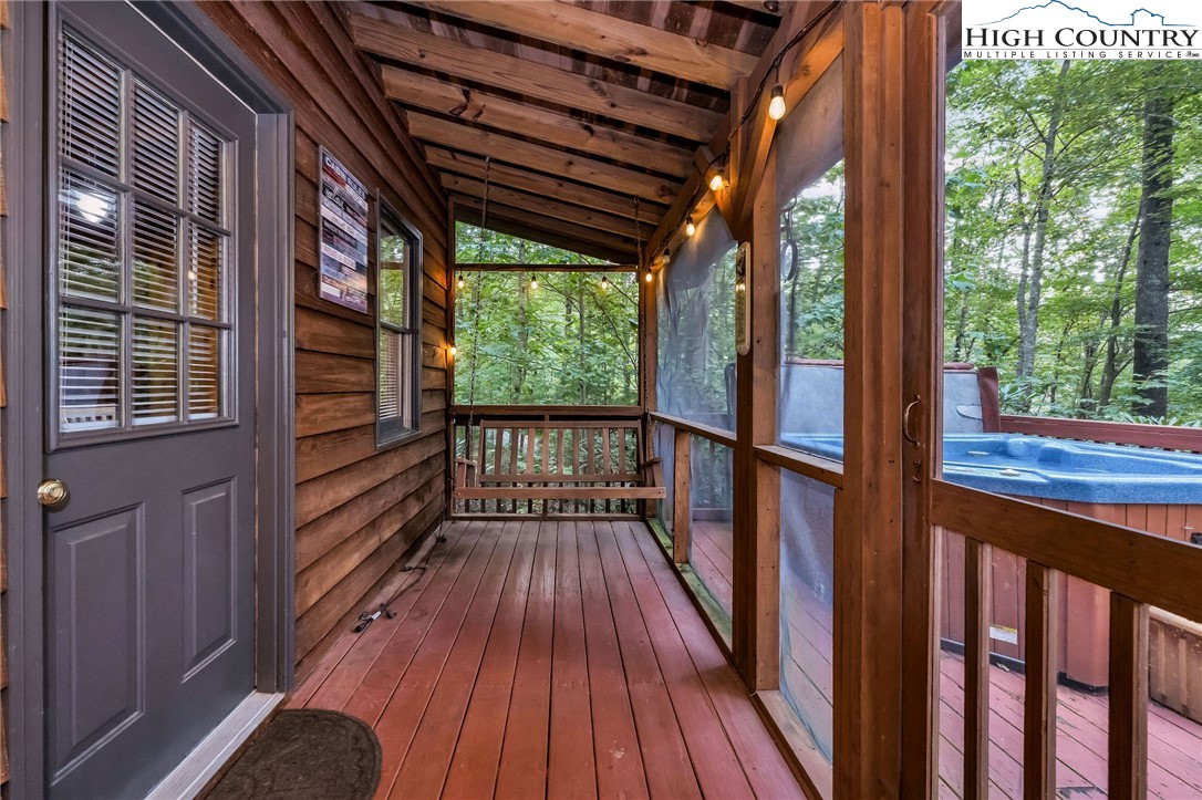 199 Skyline Road West Jefferson, NC 28694 - Photo 15 of 35 a view of balcony with wooden floor