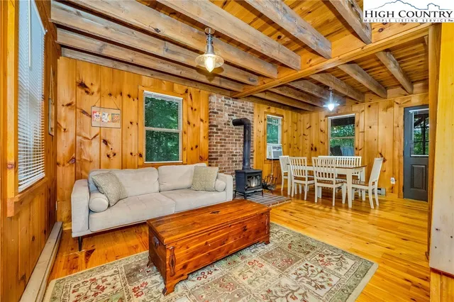 a living room with furniture and a table