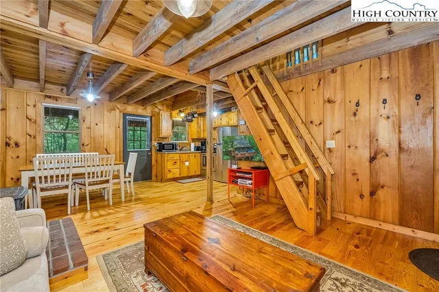 a view of a patio with table and chairs