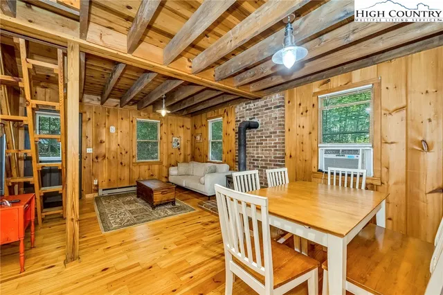 a view of a patio with a table and chairs