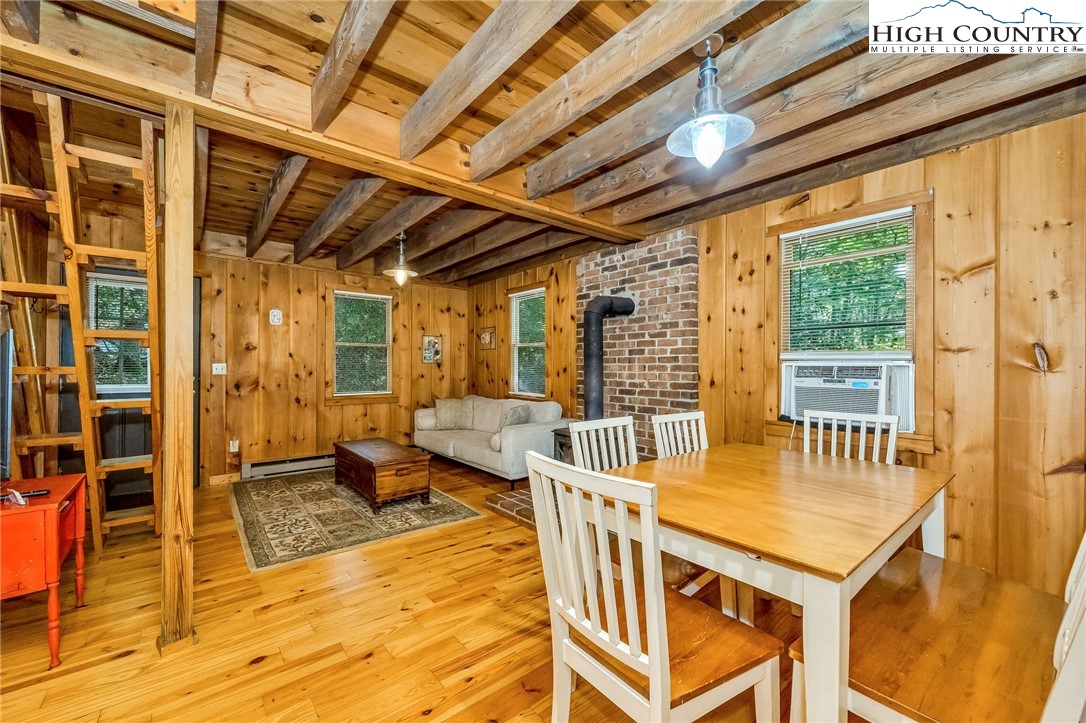 199 Skyline Road West Jefferson, NC 28694 - Photo 10 of 35 a view of a patio with a table and chairs