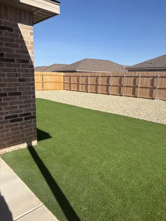 a view of an outdoor space and a yard
