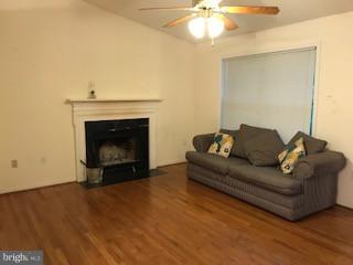 55 Buck Road Linden, VA 22642 - Photo 8 of 14 a living room with furniture and a fireplace