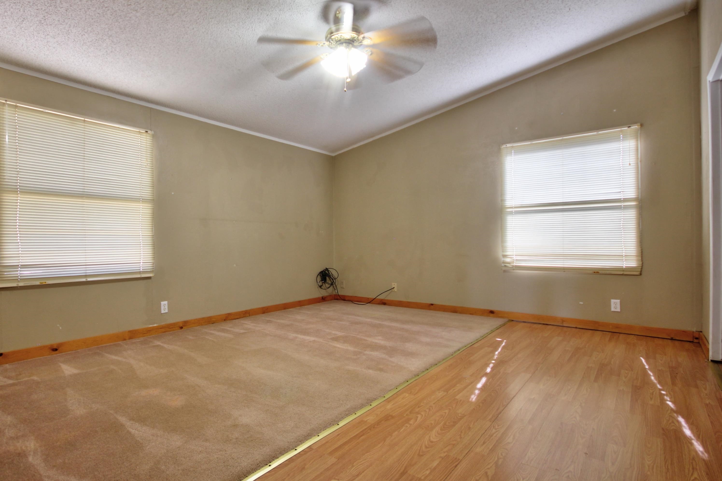1504-2 Ranch Road 261 Buchanan Dam, TX 78609 - Photo 13 of 22 a view of an empty room with a window